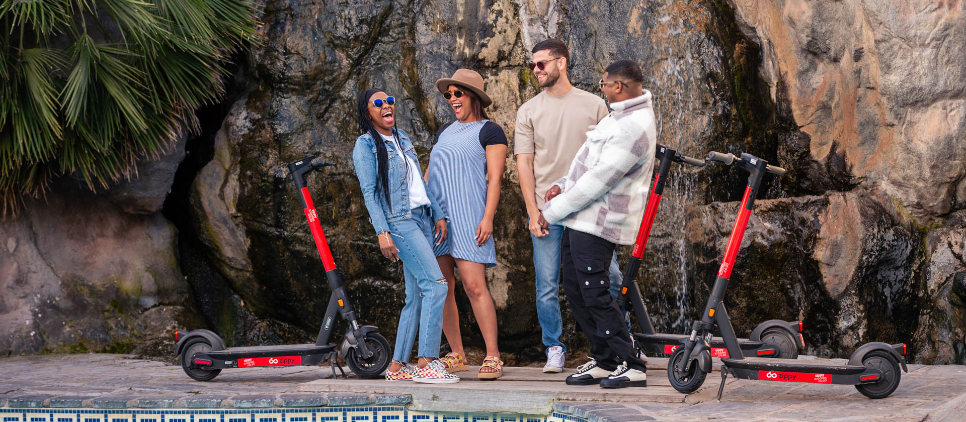 Group of friends with Zippy scooters